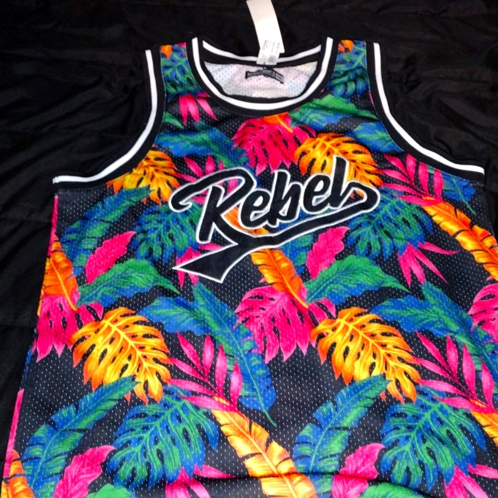 Black and floral colored jersey with black and white trimming, patch label